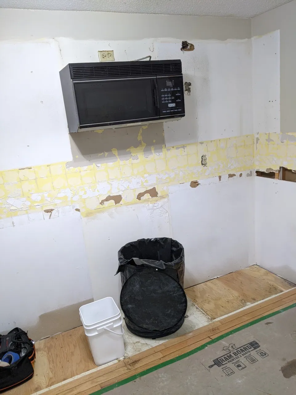 The old kitchen stripped to the wall.