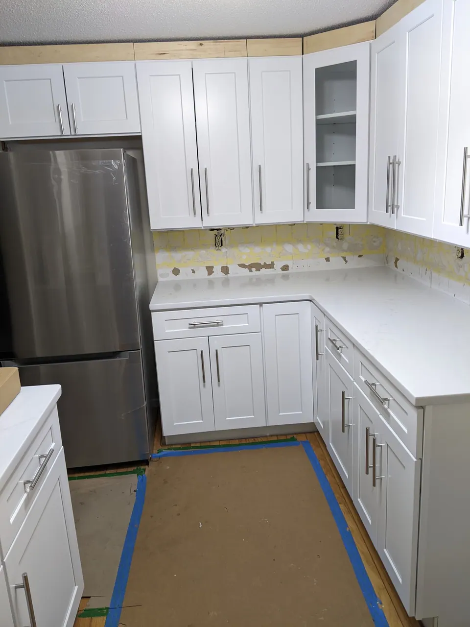 During the install: cabinets in, counter on.