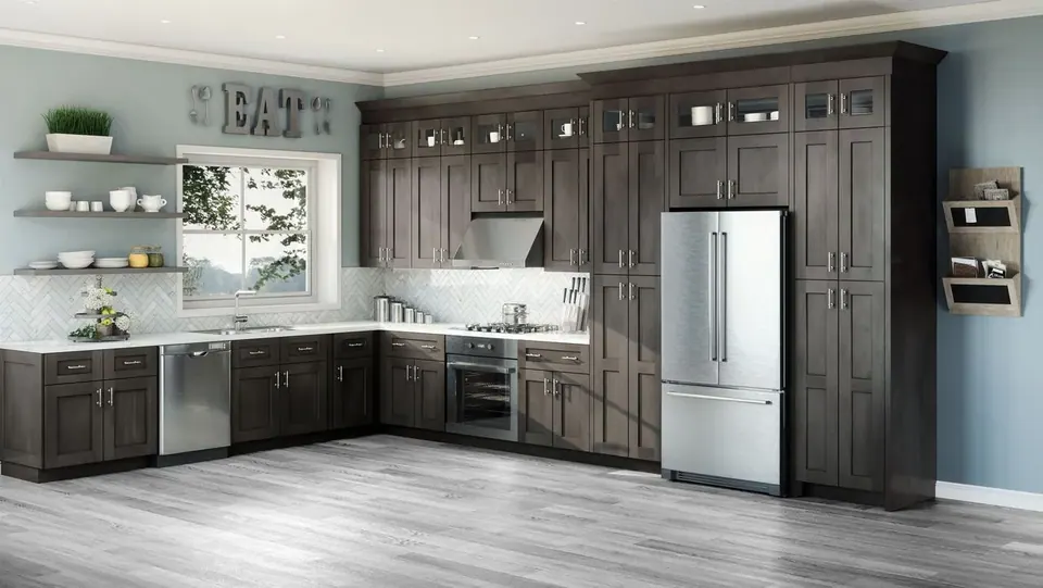 Rendering: dark gray-brown shaker cabinets along two walls, glass-front uppers to the ceiling, white counters, open shelves.
