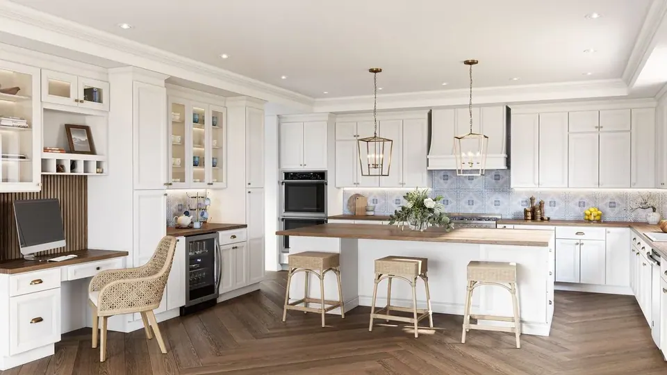 Rendering: white cabinets with a wood-topped white island, a built-in desk, wall ovens and blue patterned backsplash.