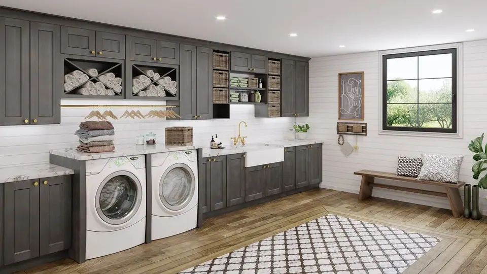 Rendering: dark gray shaker laundry cabinets over a front-load washer and dryer, farmhouse sink and marbled counter.