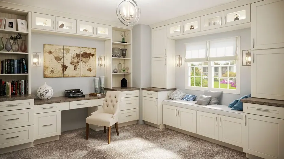 Rendering: cream shaker built-in desk, bookshelves and window seat with brown counters and lit glass-front uppers.